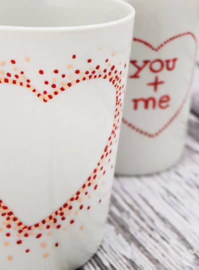 Painting ceramic coffee mugs with sharpies are not permanent! Today I am sharing a way to create those cute pinterest mugs that are actually dishwasher safe. These coffee mug crafts are for valentine's day, but who needs a holiday to create cute mugs.
