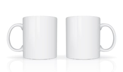 Two coffee mugs on white background.