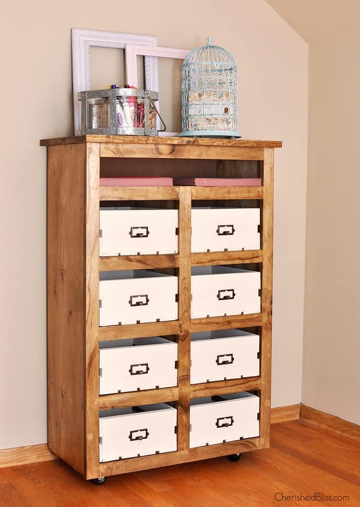 DIY shelves with crates and labels for an organized office space