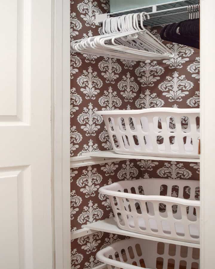 Laundry Closet Makeover - Turning a broom closet into a functional space to stack laundry in baskets