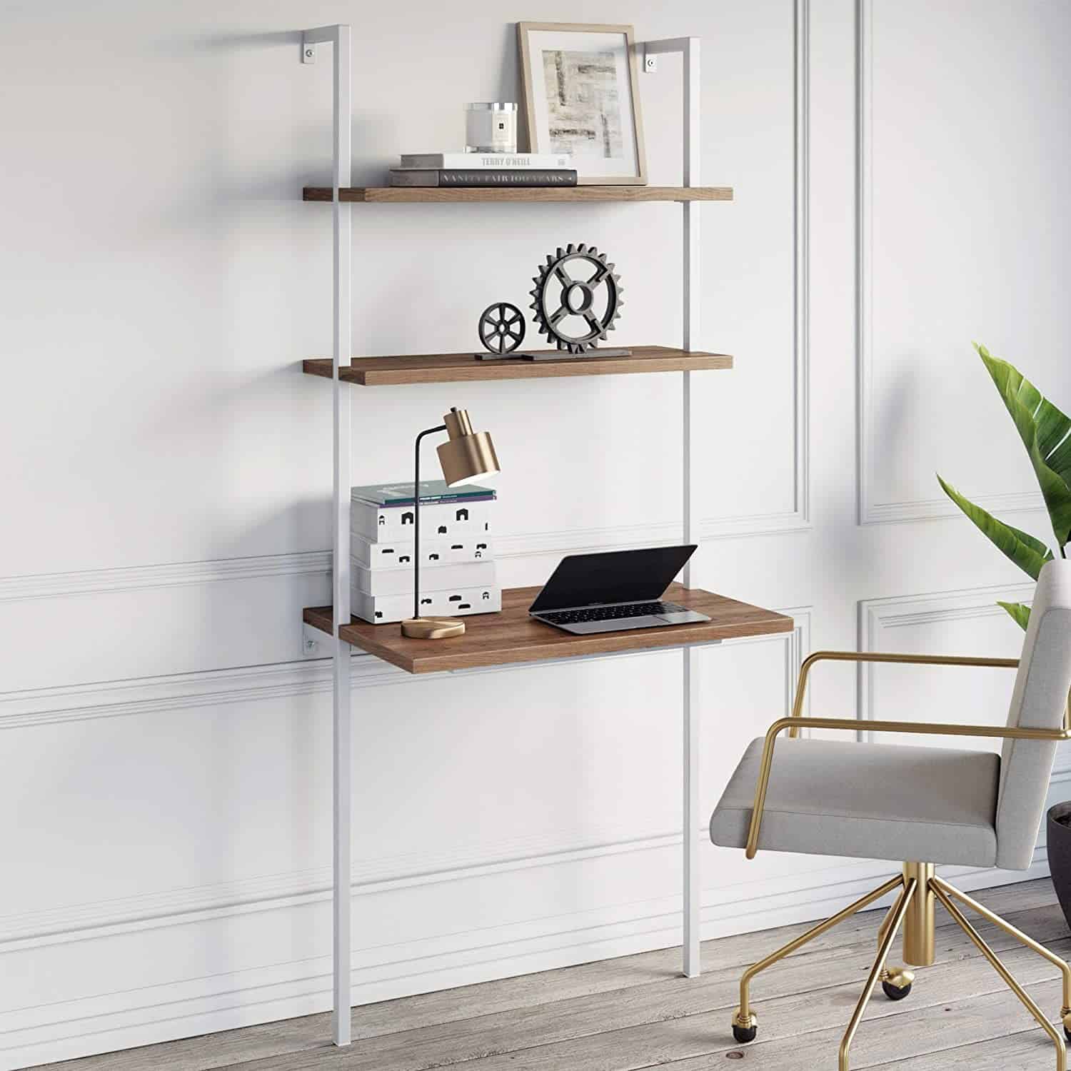 ladder style space saving desk mounted on the wall.