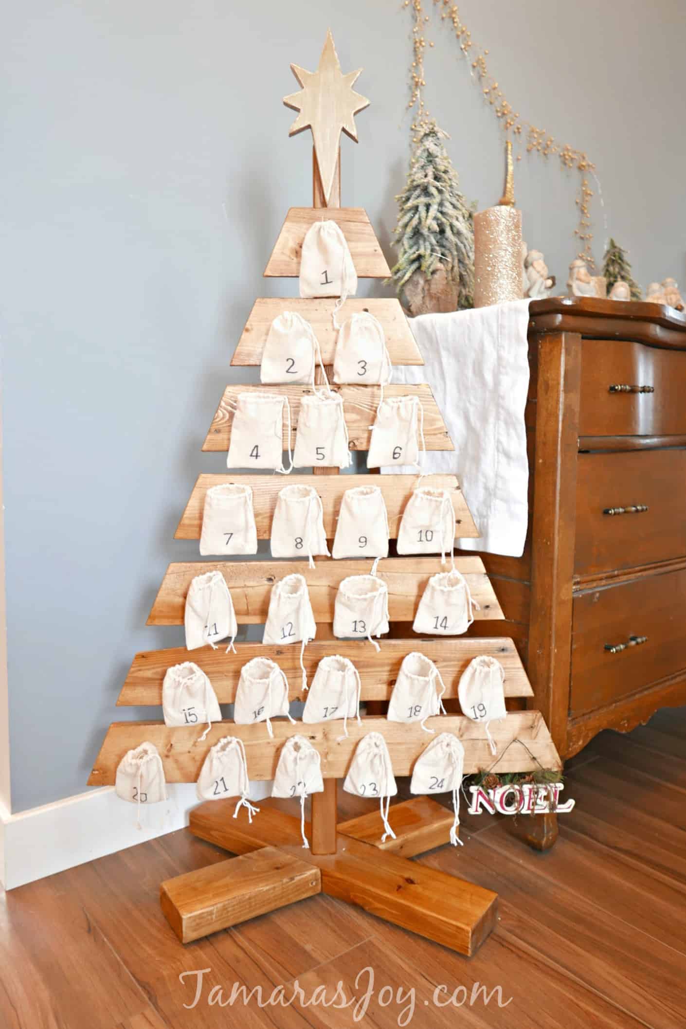 Wood Christmas tree advent calendar with base.