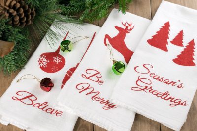 Christmas Stencil in 3 designs for free! nciled Tea Towels - Free Christmas Silhouette Icons to create stencils including jumping reindeer, ornaments, Christmas Tree silhouettes, and text. Files are available in PDF and free silhouette cutfiles.