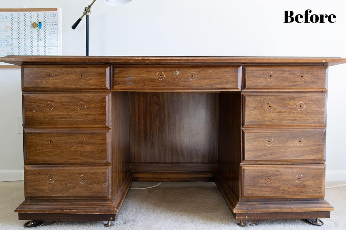 Antique desk before DIY makeover with hardware removed. 