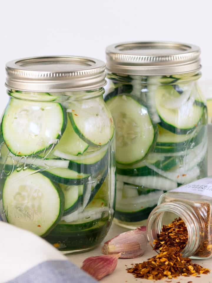Cucumber salad in canning jars.