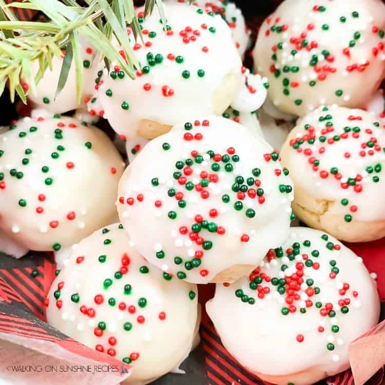 Italian Christmas cookies with red and green sprinkles in a pile.