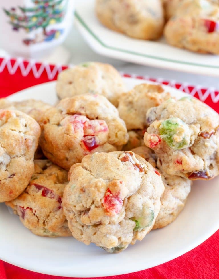 Closeup of fruitcake cookies on a plate.