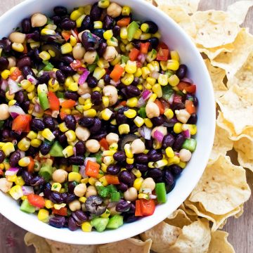 This delicious corn and black bean salad packs a healthy punch with lots of vegetables and a fresh cilantro dressing. It is bursting with fresh and filling flavor!