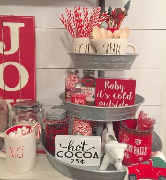 Hot chocolate bar set up using a tiered tray decorated in red and white.