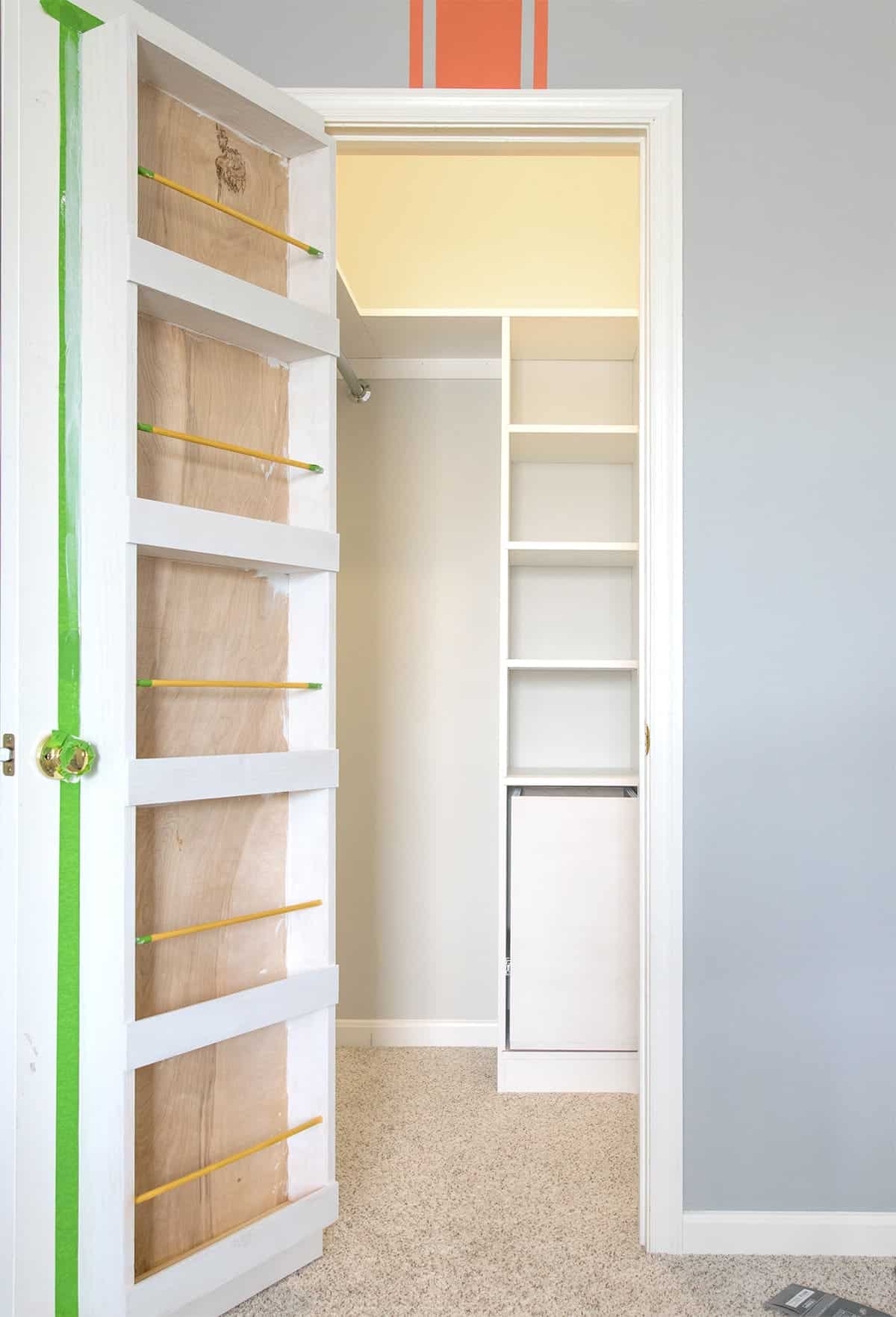 Custom Closet with built-ins and shelving after priming and building.