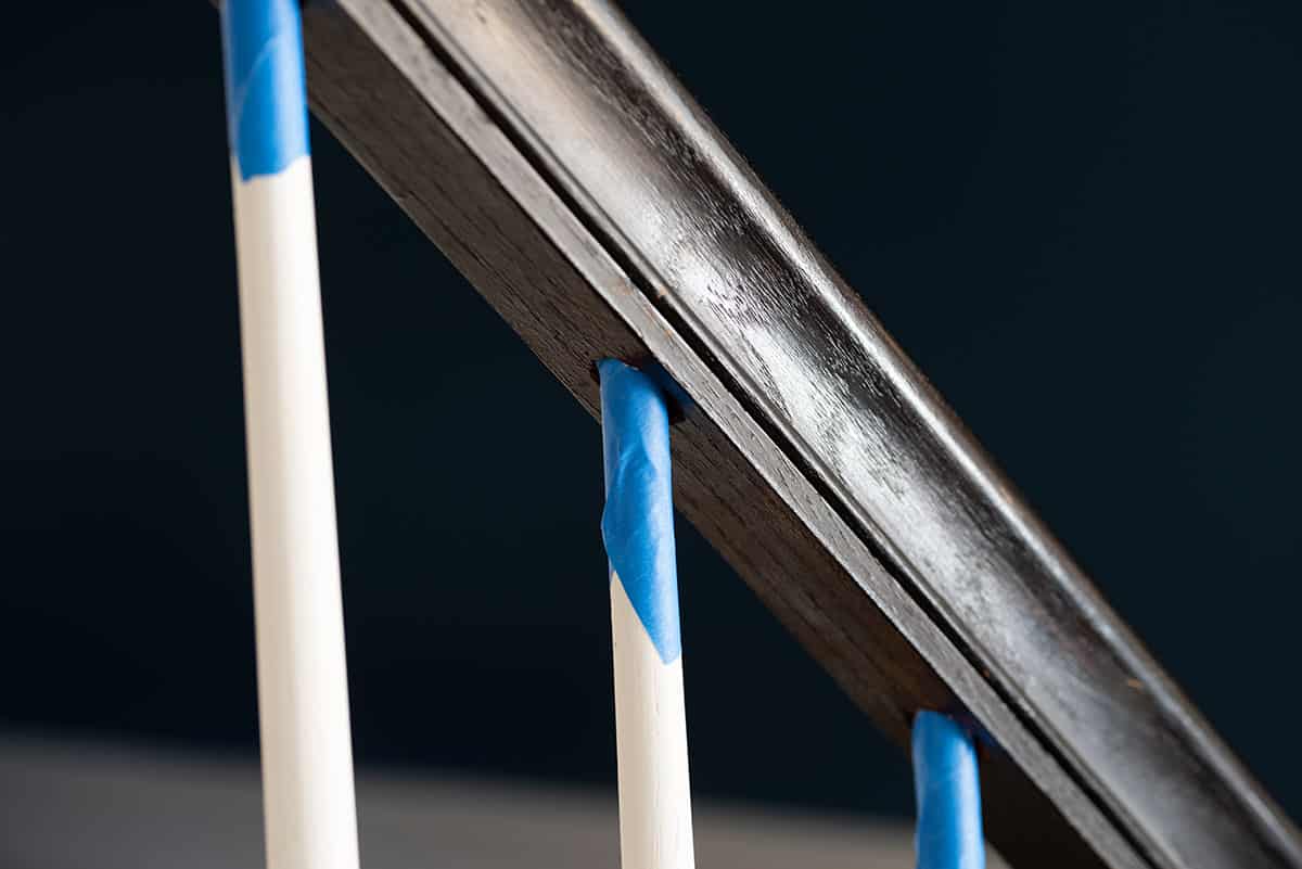 Tape on hand rails to paint with a clean edge.