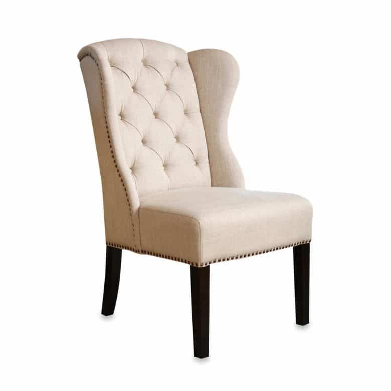 Wingback dining chair with tufted back.