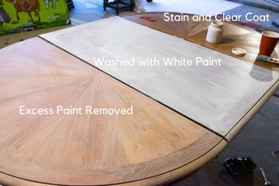 Steps to cerusing a table including white washing and paint.
