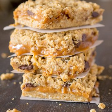 Oatmeal Carmelita bars stacked on top of each other.