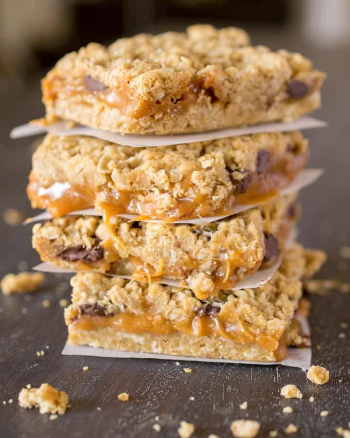 Oatmeal Carmelita bars stacked on top of each other.