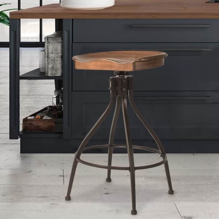Adustable bar stool with wood top for bar or counter height.