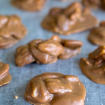 New Orleans Pralines Cookies cooling on wax paper.