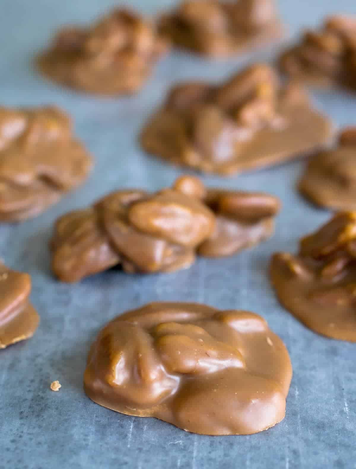 Batch of Southern Pecan Pralines  on parchment paper