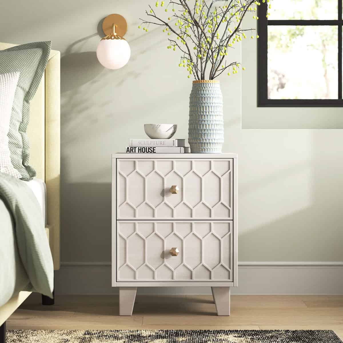 Gray hexagonal pattern nightstand features dovetail joints and chrome drawer pulls. 