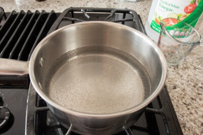 Water boiling on the stove.