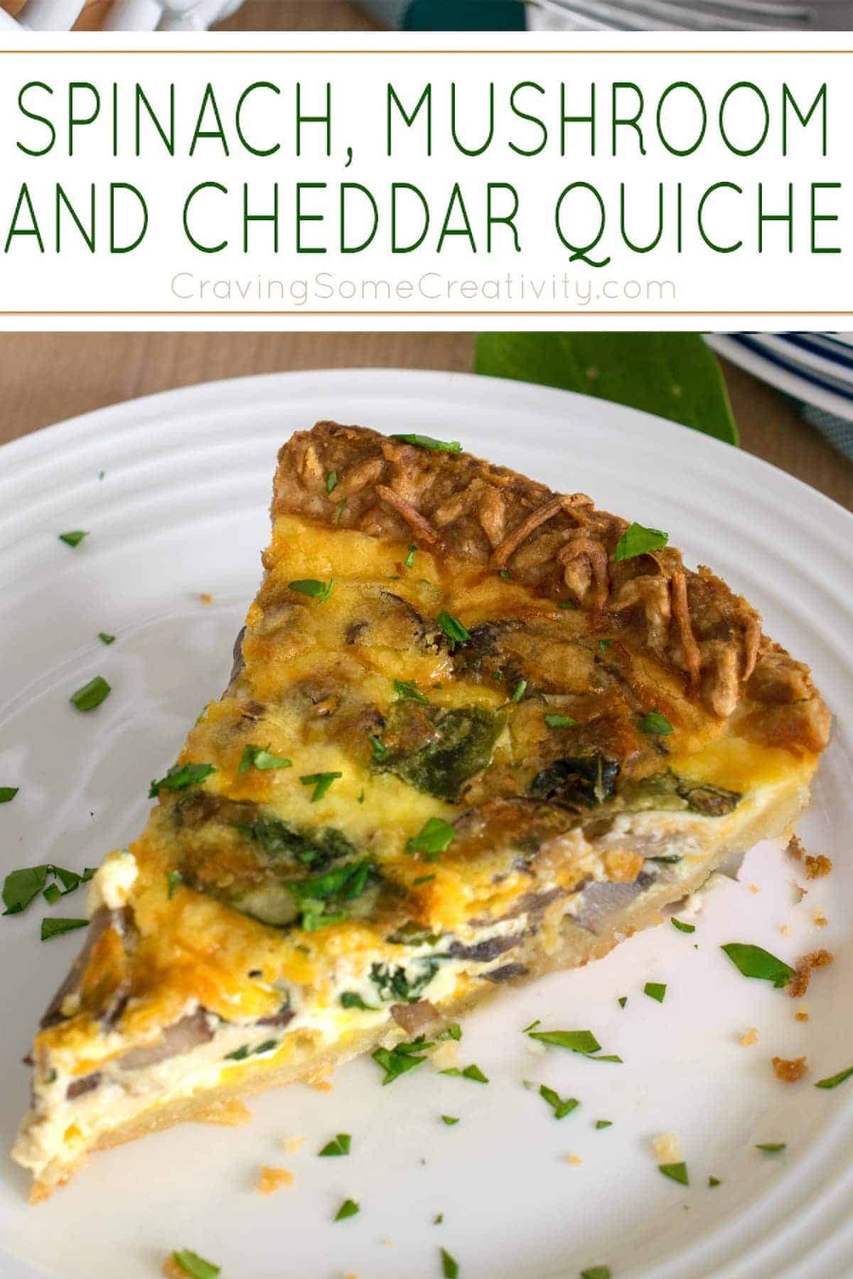 Slice of Spinach Mushroom Quiche with crust and fresh herbs on white plate with title.