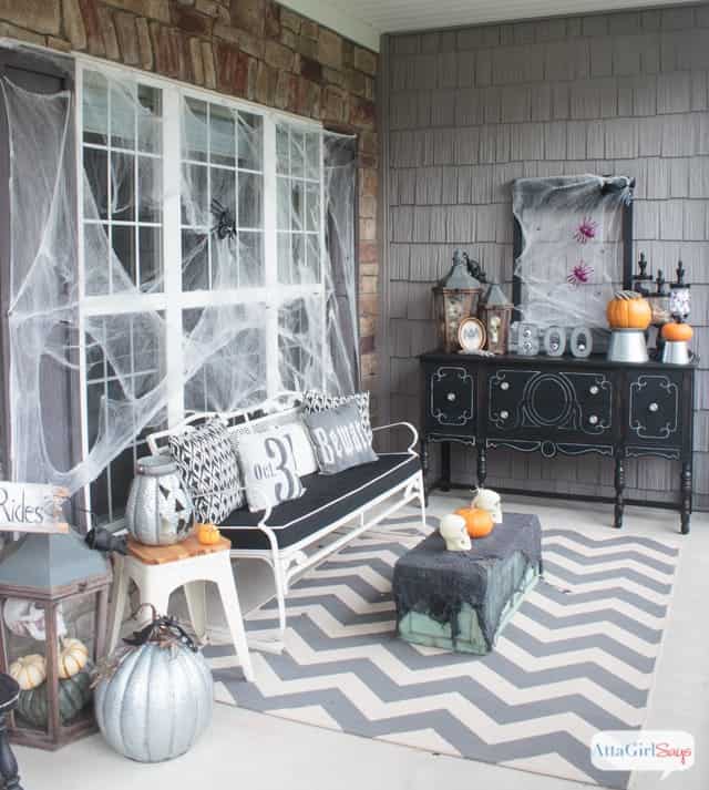 Haunted gothic novel styled porch decor in black, white and silver.