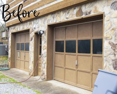 Beaten up garage doors before painting.