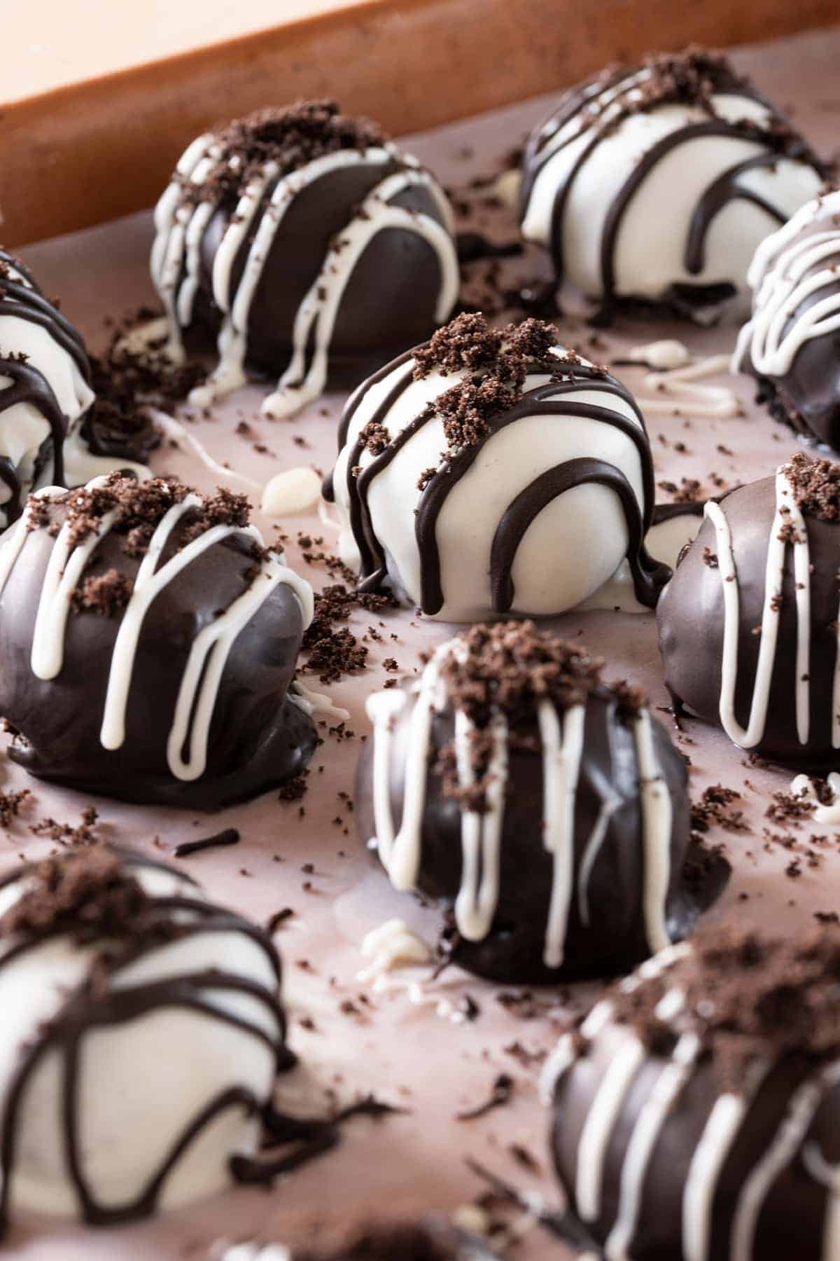 Decorated Oreo Truffles Closeup on a cookie sheet and wax paper