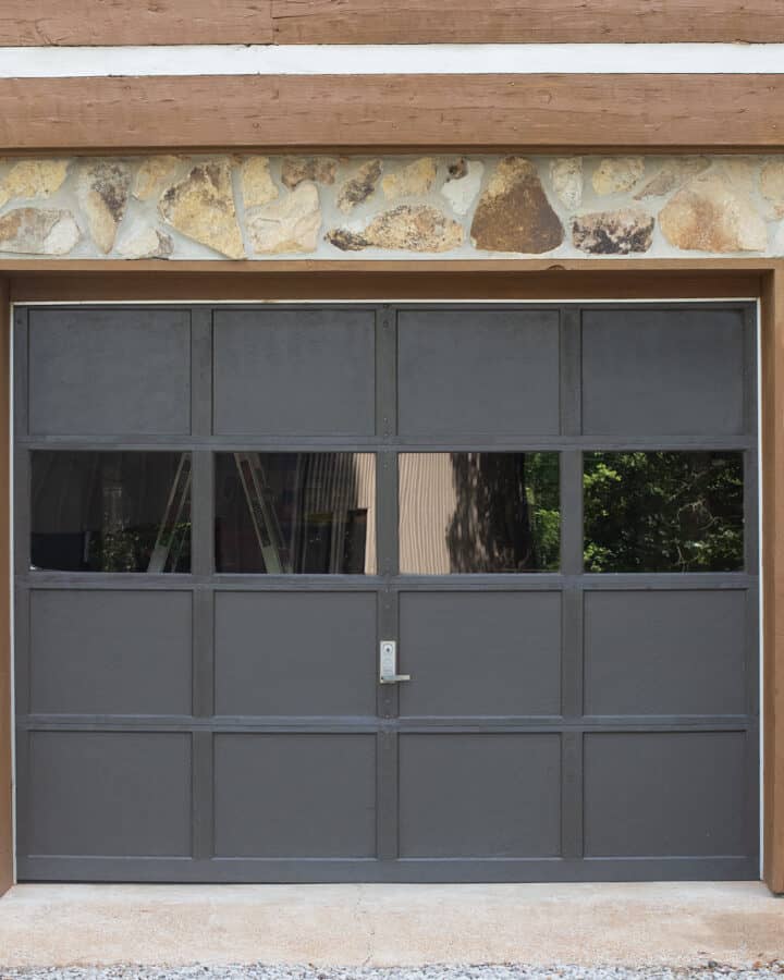 Gray garage door with windows.