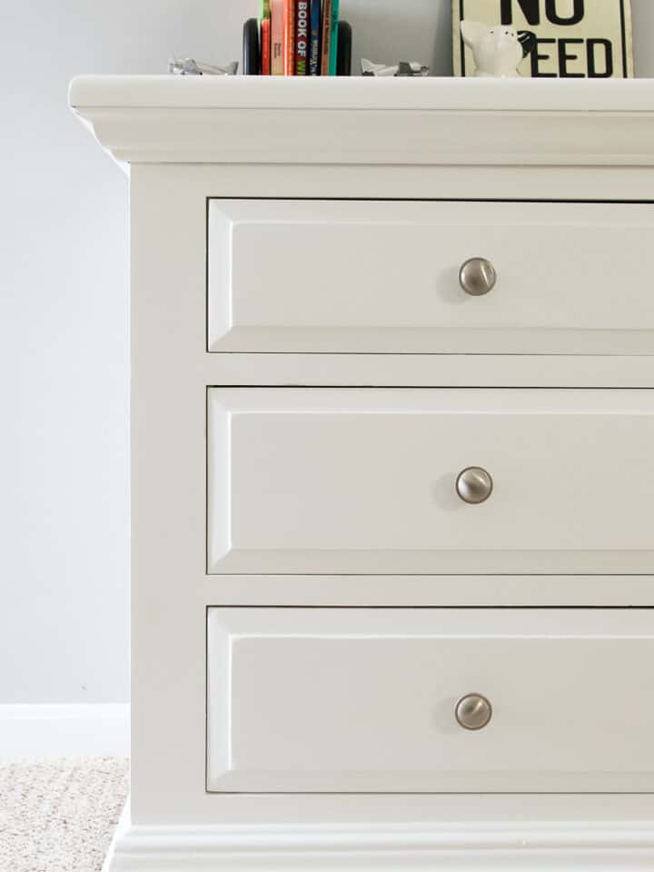 White painted dresser with three drawers.