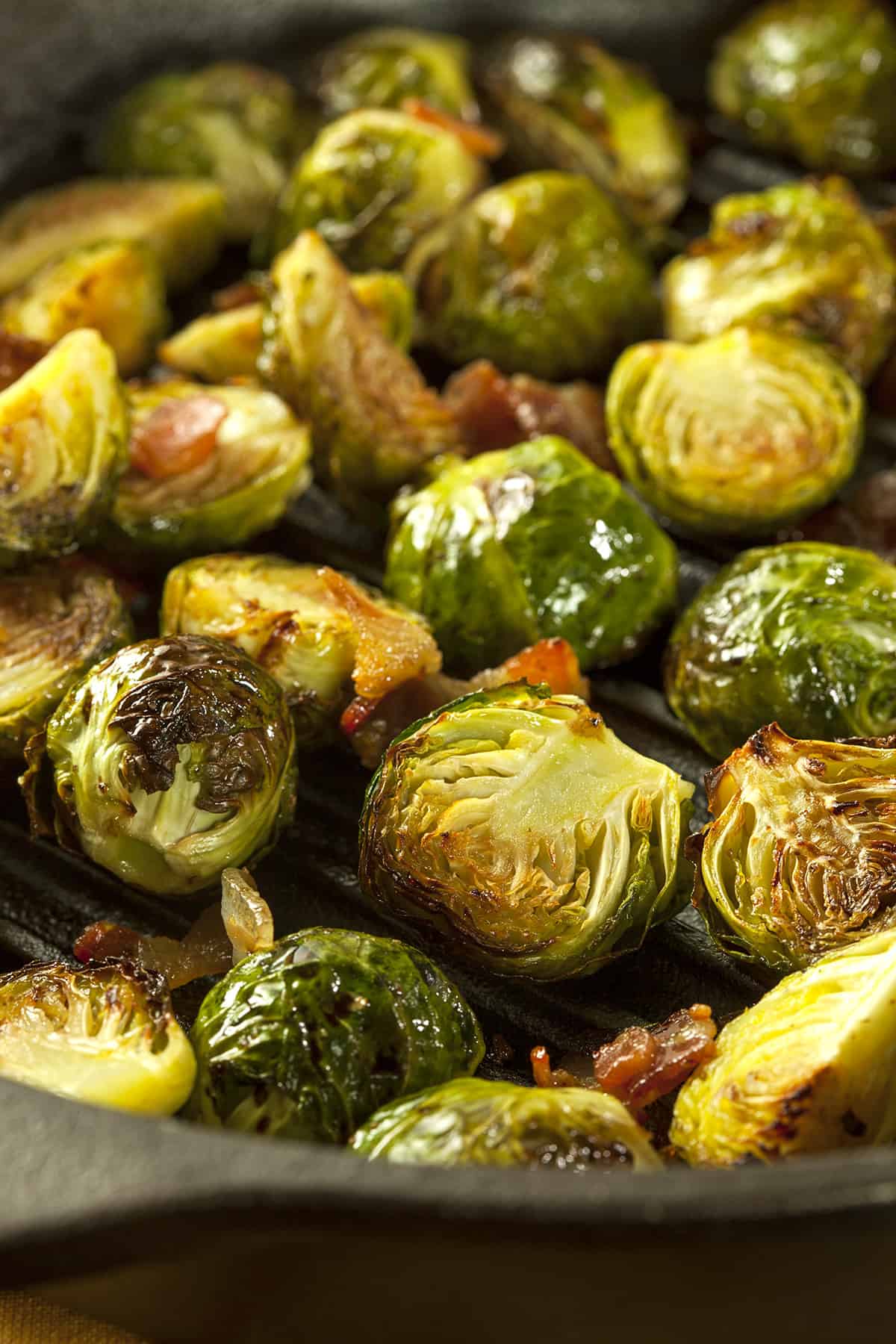 Pan roasted bacon Brussel sprouts in a pan.