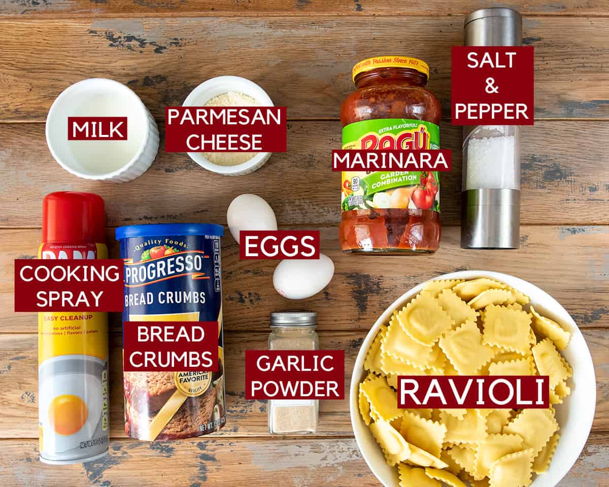 Ingredients for toasted ravioli recipe laid out on a table with text labels.
