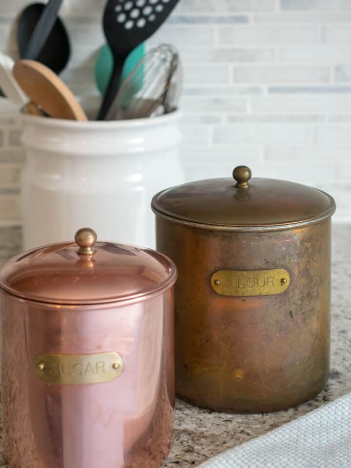 Copper is a lovely addition to a home's decorating style or cookware, but I was hesitant to bring out my grandmother's heavily tarnished copper canisters for cleaning until I learned about this genius trick!