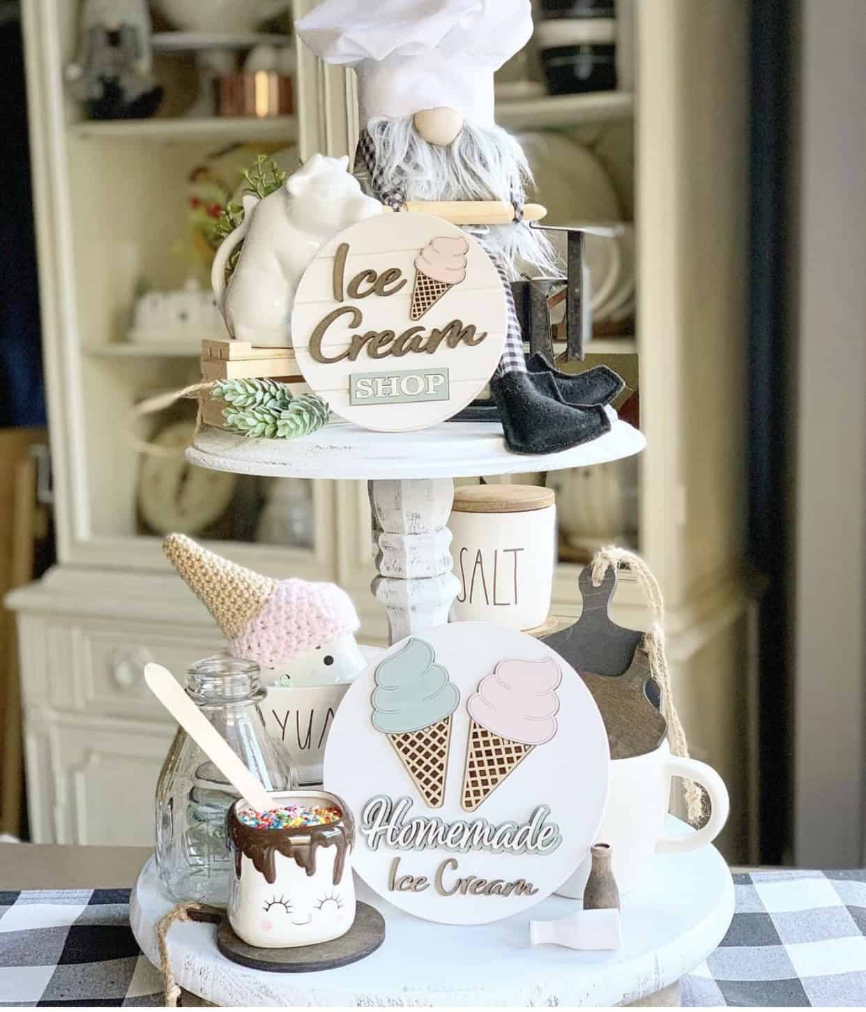 2-tiered tray with ice cream vignette. Pastry chef figure, ice cream signs and pastel color theme.