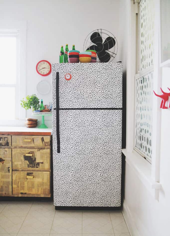 Decorated refrigerator with polka dot stickers.