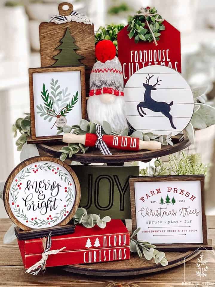 2-tiered wooden tray with assorted Christmas tree farm decor items