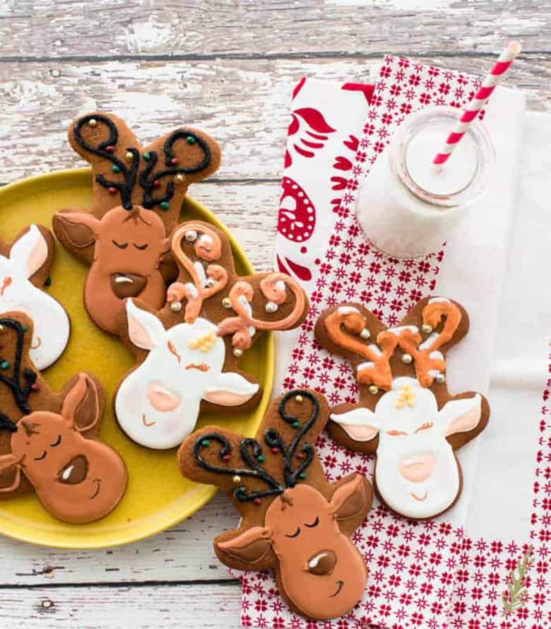 Reindeer cookies with icing faces made on gingerbread men cookies.