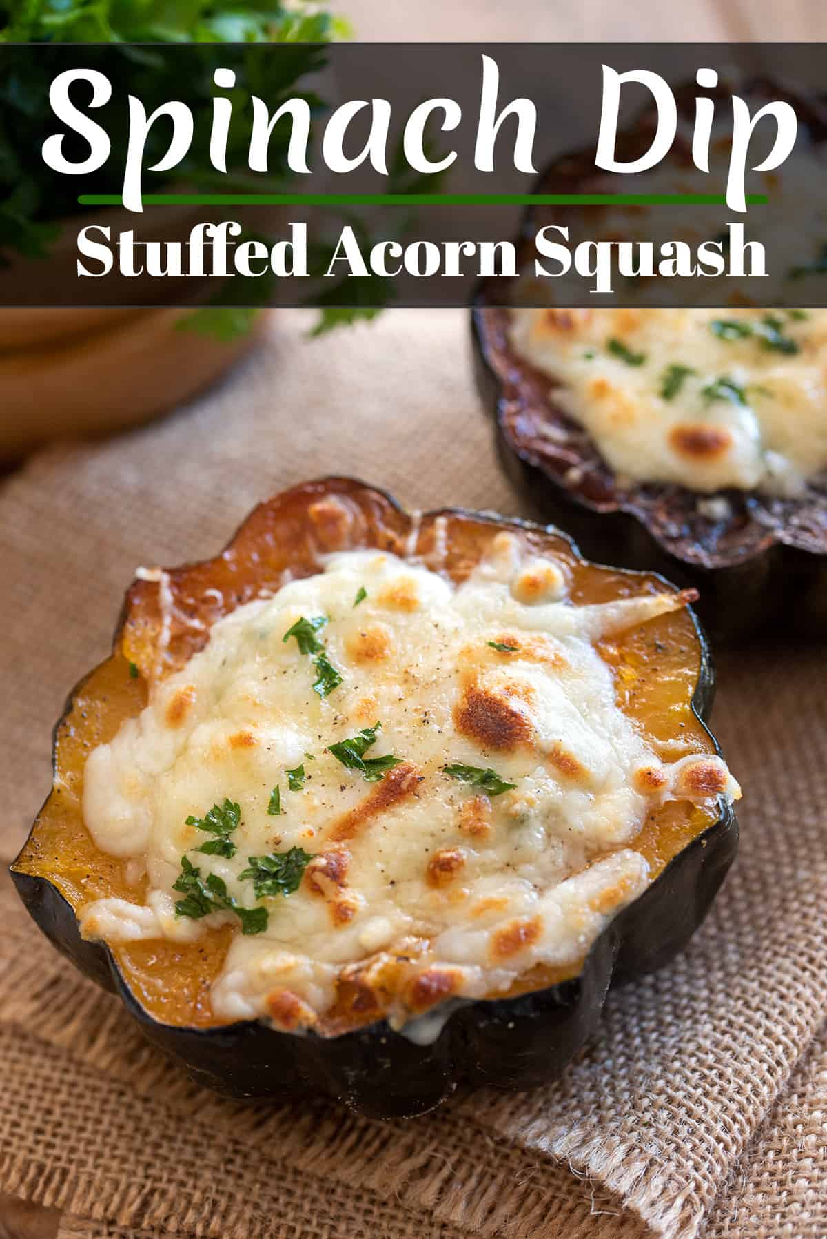 Spinach stuffed acorn squash face up on cutting board with title.
