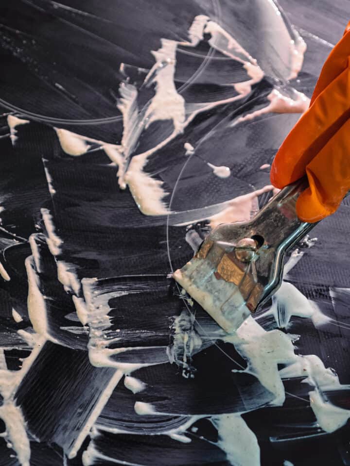 How to clean a glass stove top with closeup and cleaner.