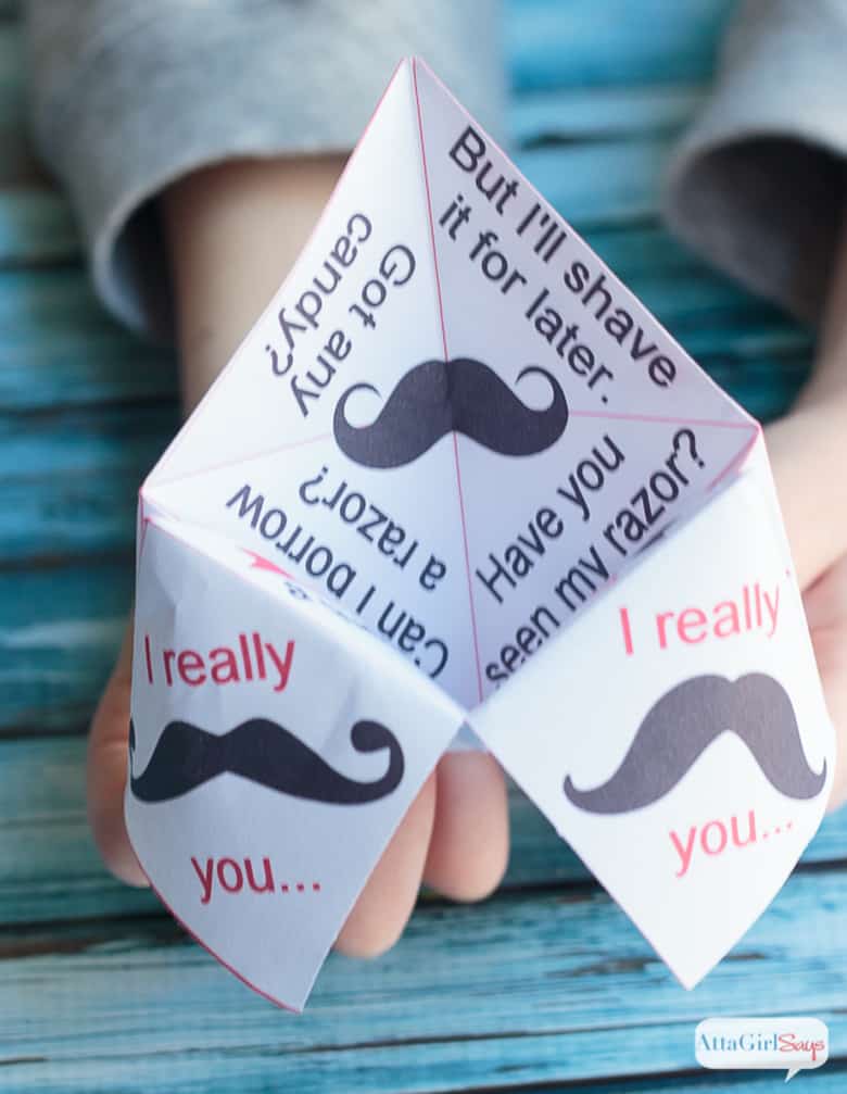 Fortune teller or cootie catcher printable opened up to ask questions.