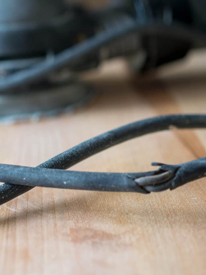 A broken extension cord that will be repaired with a title overlay.