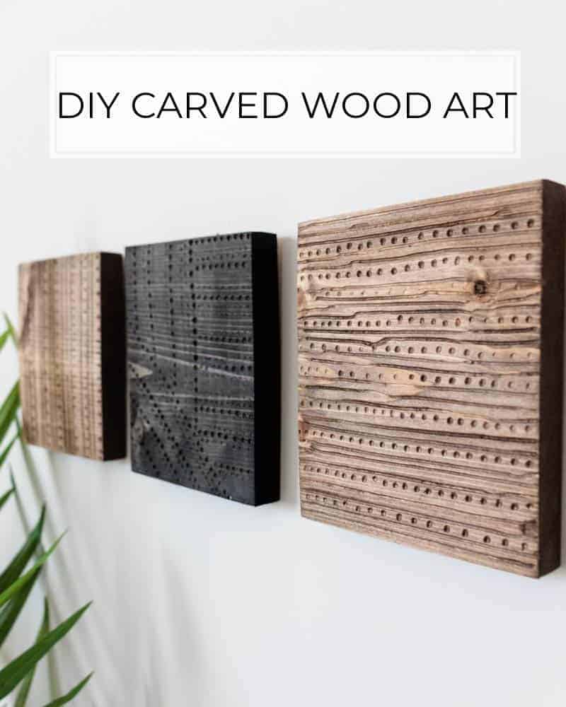 Three square wood wall decor hangings with tribal carved patterns and stained wood.