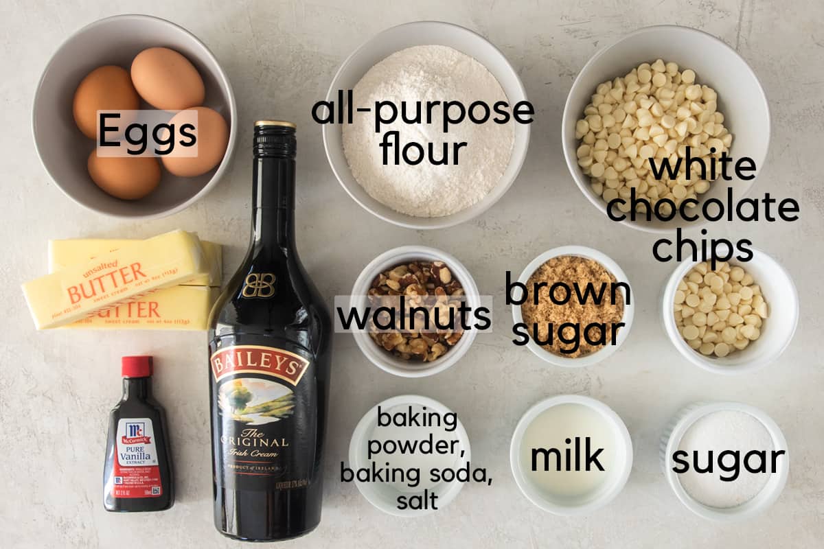 Cake ingredients laid out with text labels.