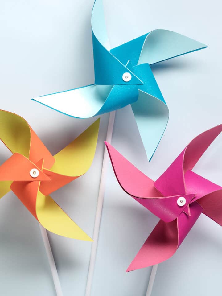 Three DIY Windmills craft on white backgroubd.