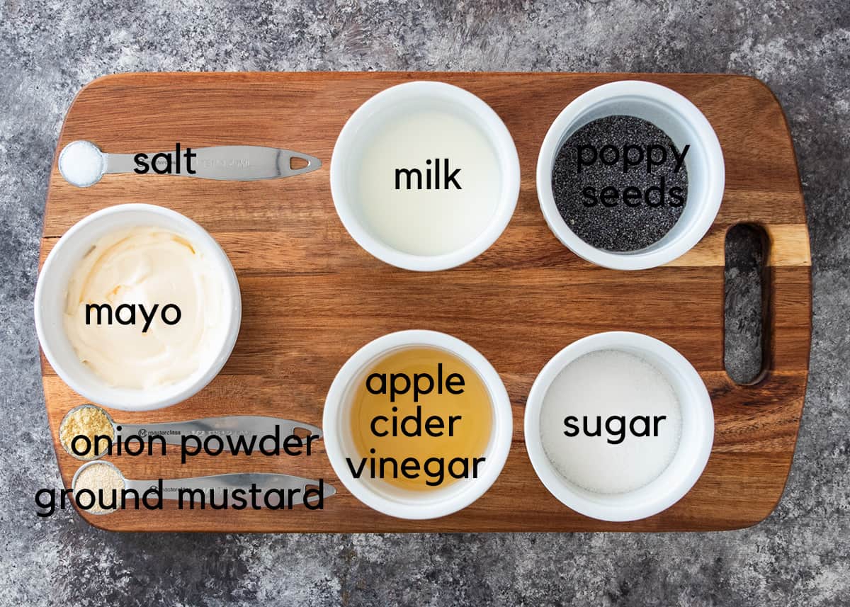 Poppyseed salad dressing ingredients laid on a table with text labels.