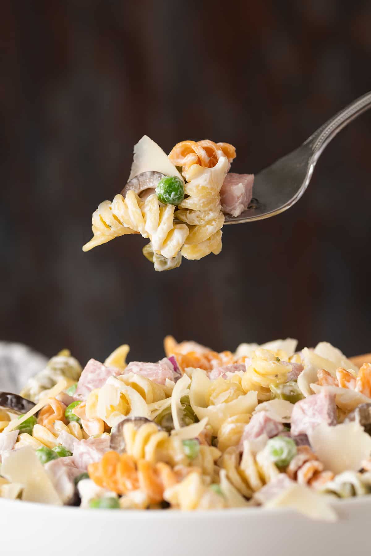 Ham Pasta salad with Ranch dressing and peas.