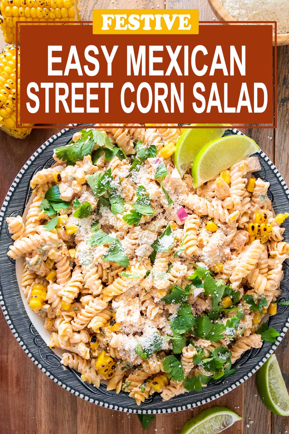 Overhead of mexican street corn pasta salad on a plate with cotija cheese sprinkled on top and title overlay.