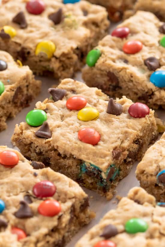 Closeup of monster cookie bars laid out on a tray.