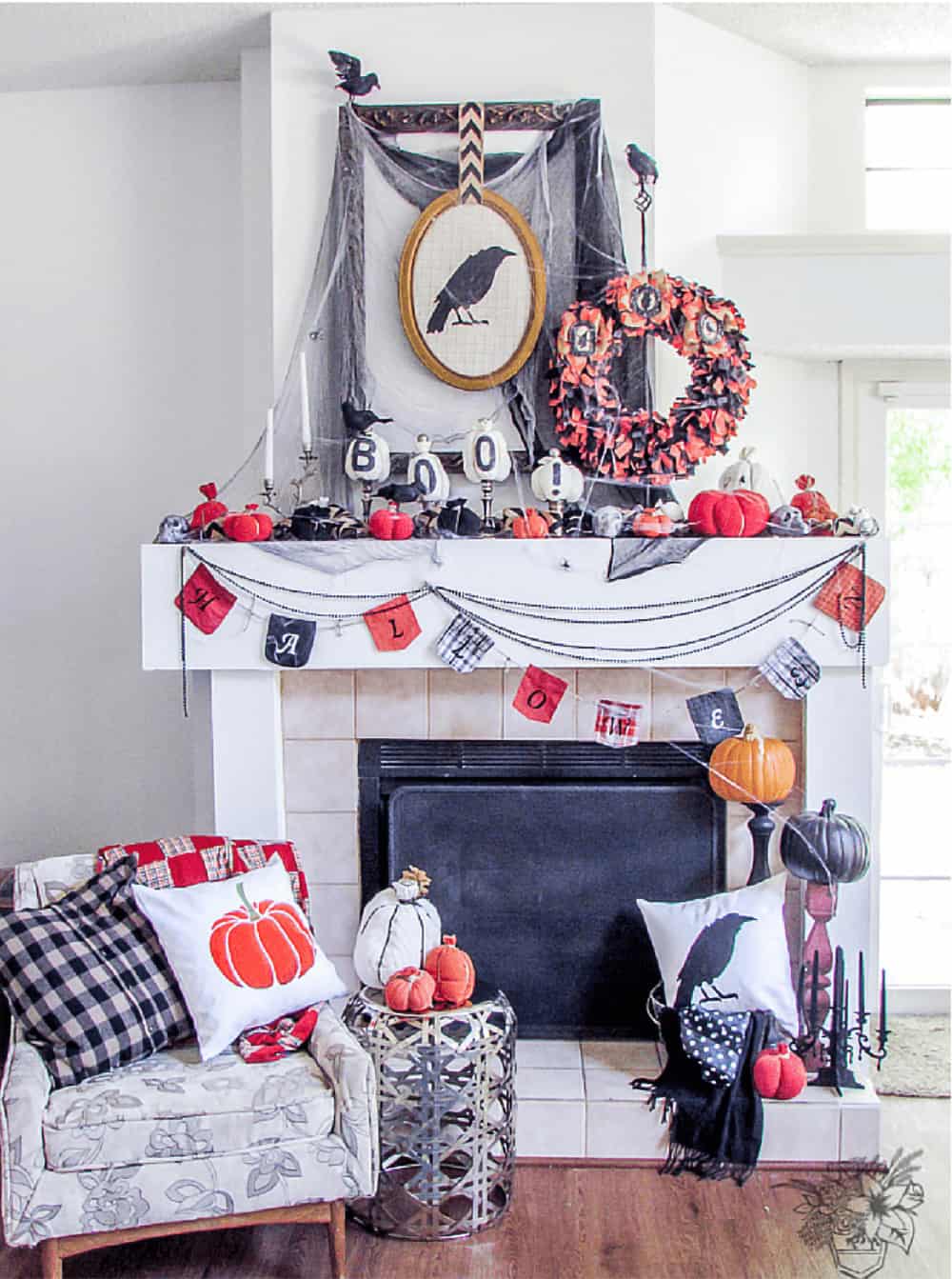 Farmhouse Halloween decor with DIY crafts like a rag wreath, portraits, and garland.