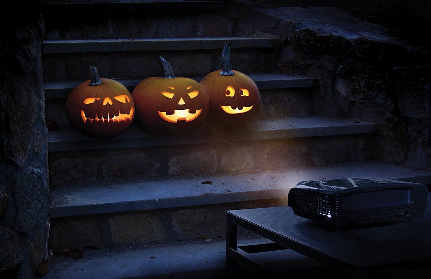 Three pumpkin projections on the steps.